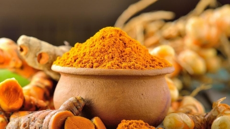 Answer questions about acne scar treatment with fresh turmeric